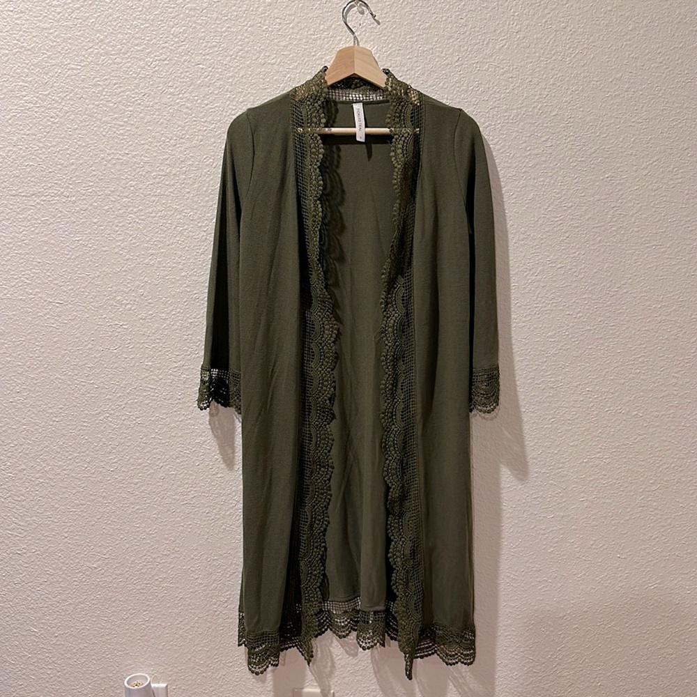 Lightly used . Tickled Teal . Small . Olive green Cardigan . Lace trim detail .